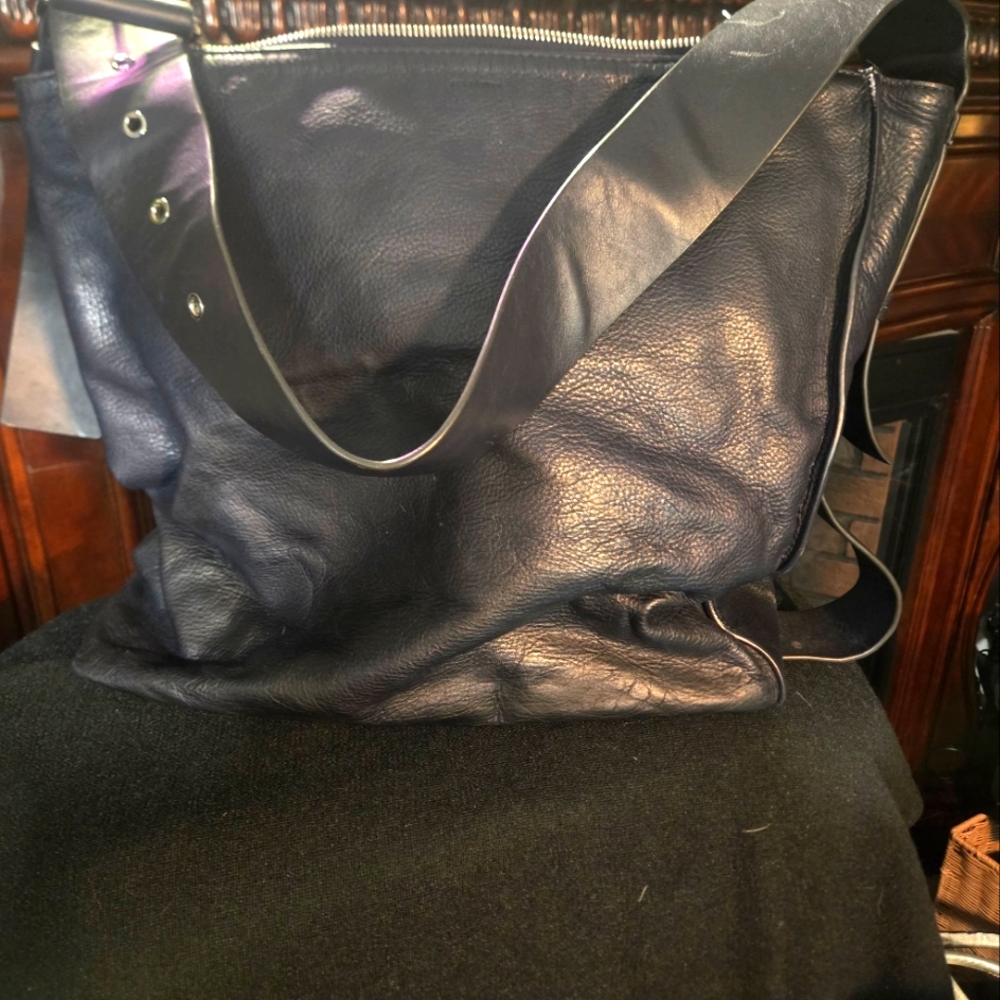 All Saints Blue leather bag.
